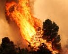 Wildfires rage across Greece, threatening homes – video